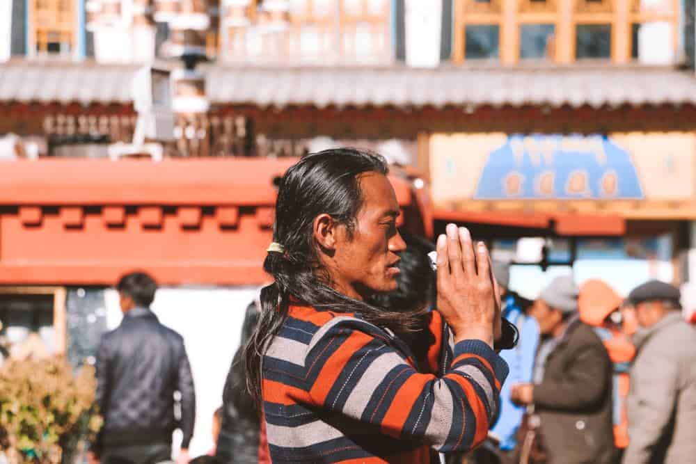 Man praying in Tibet